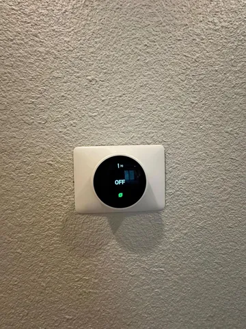 a room with a washing machine and sink