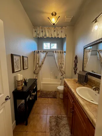 a view of a golf course with a lake