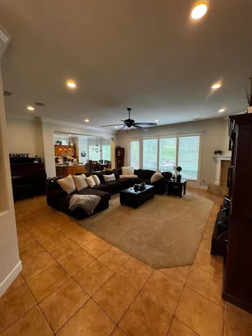 a bedroom with furniture and window