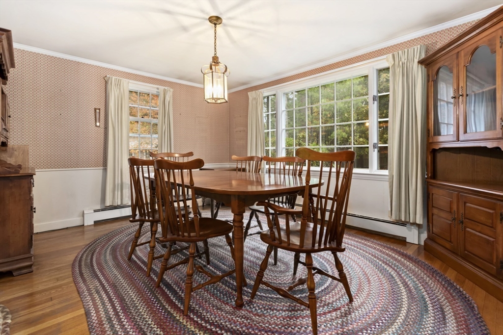 33 Wing Road Lynnfield, MA 01940 - Photo 13 of 29 a view of a dining room with furniture window and wooden floor