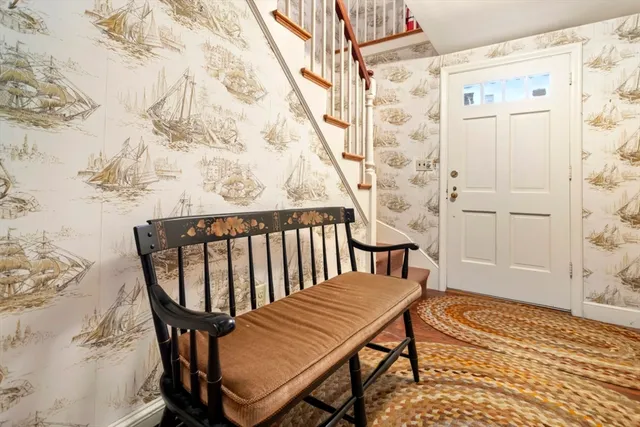 a balcony with wooden floor