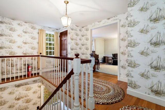 a view of a balcony with furniture