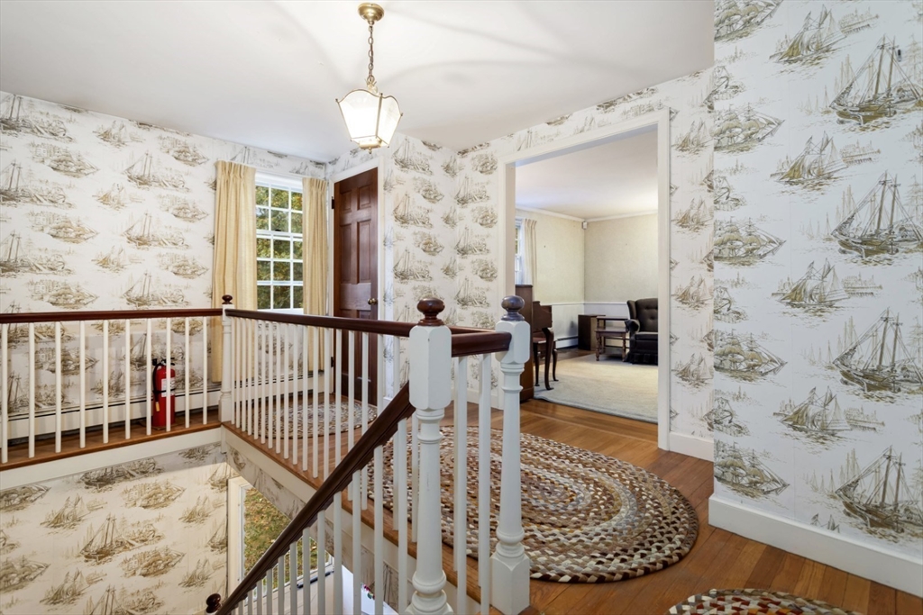 33 Wing Road Lynnfield, MA 01940 - Photo 8 of 29 a view of a balcony with furniture