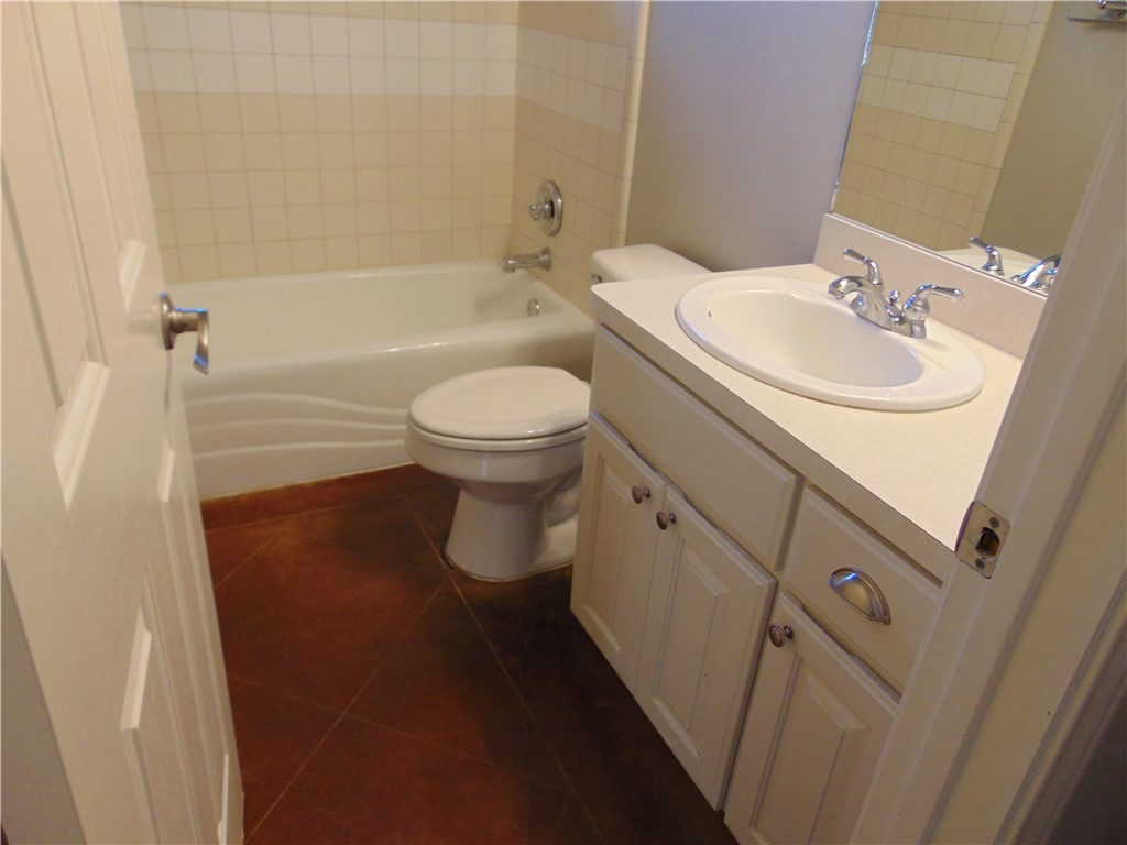 Undisclosed Address Dripping Springs, TX 78620 - Photo 7 of 14 a bathroom with a sink toilet and shower