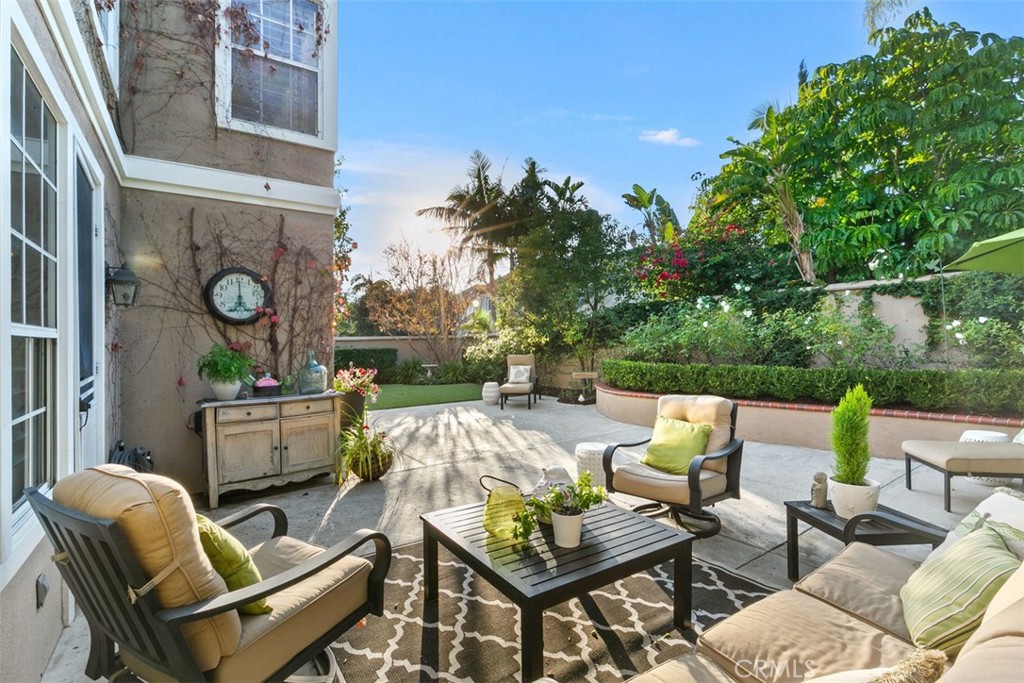 37 Highpoint Rancho Santa Margarita, CA 92679 - Photo 1 of 1 a backyard of a house with barbeque oven table and chairs