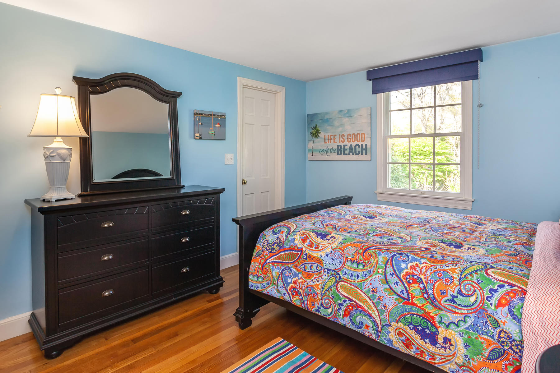 169 Scudder Road Osterville, MA 02655 - Photo 9 of 11 a bedroom with a bed and a mirror on dresser
