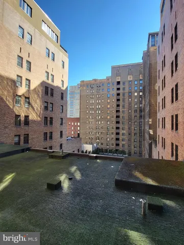 a view of a building with a yard