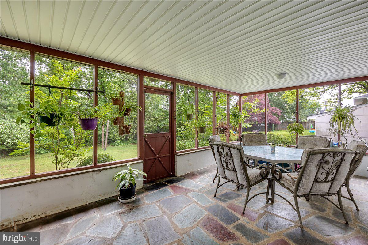 519 Bancroft Road Cherry Hill, NJ 08034 - Photo 13 of 28 a dining room with stainless steel appliances hardwood table and chairs