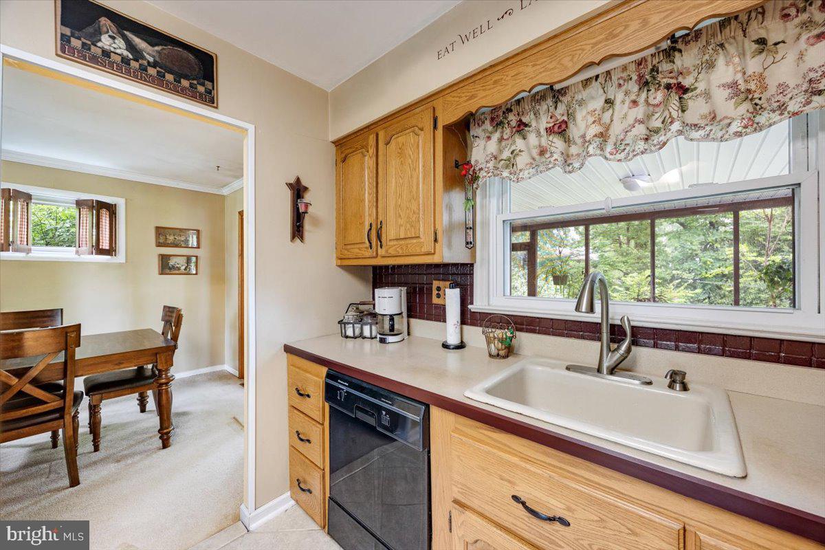 519 Bancroft Road Cherry Hill, NJ 08034 - Photo 17 of 28 a kitchen with a sink cabinets and window