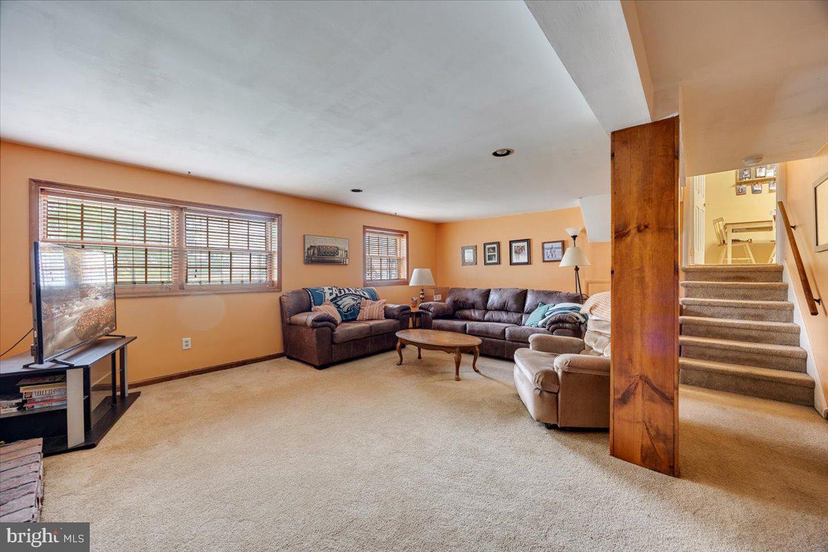 519 Bancroft Road Cherry Hill, NJ 08034 - Photo 19 of 28 a living room with furniture and a flat screen tv