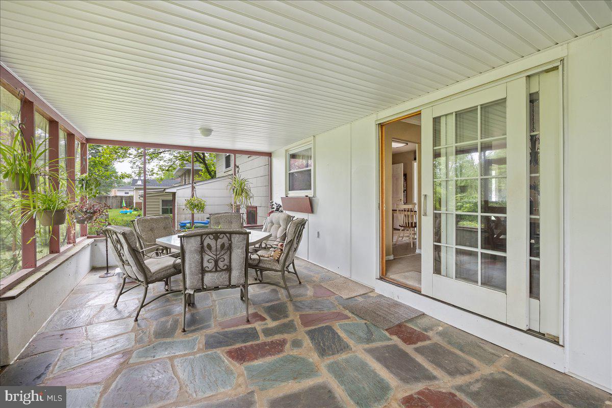 519 Bancroft Road Cherry Hill, NJ 08034 - Photo 2 of 28 a dining room with furniture and outdoor view