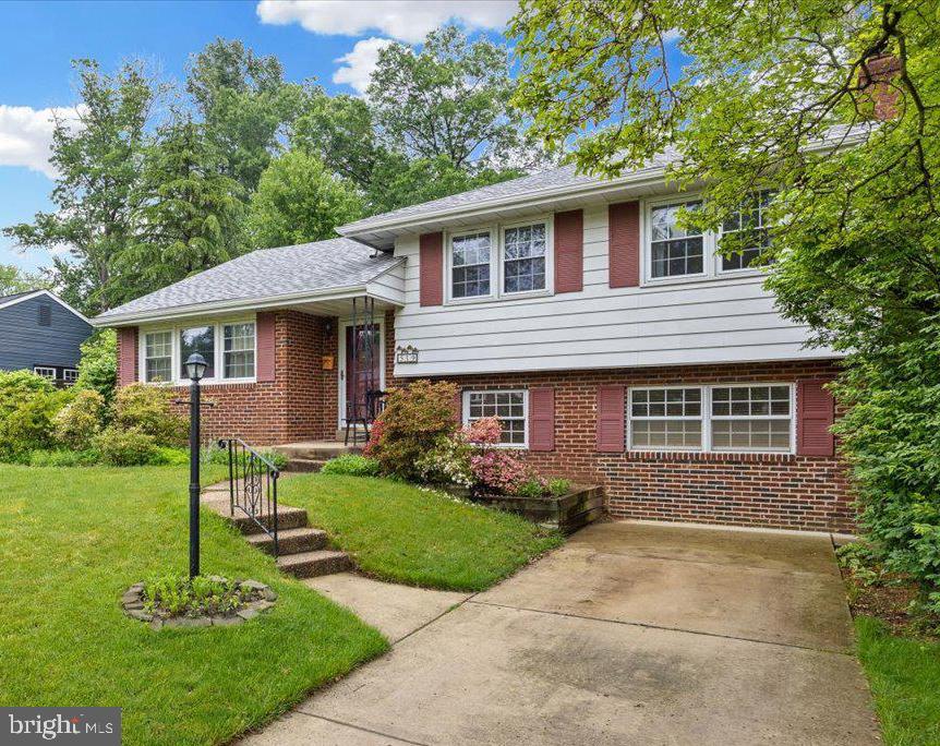 519 Bancroft Road Cherry Hill, NJ 08034 - Photo 5 of 28 a front view of a house with a yard