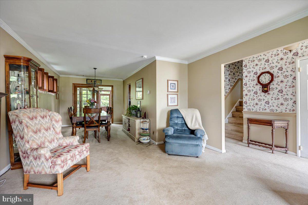 519 Bancroft Road Cherry Hill, NJ 08034 - Photo 9 of 28 a living room with furniture and a fireplace