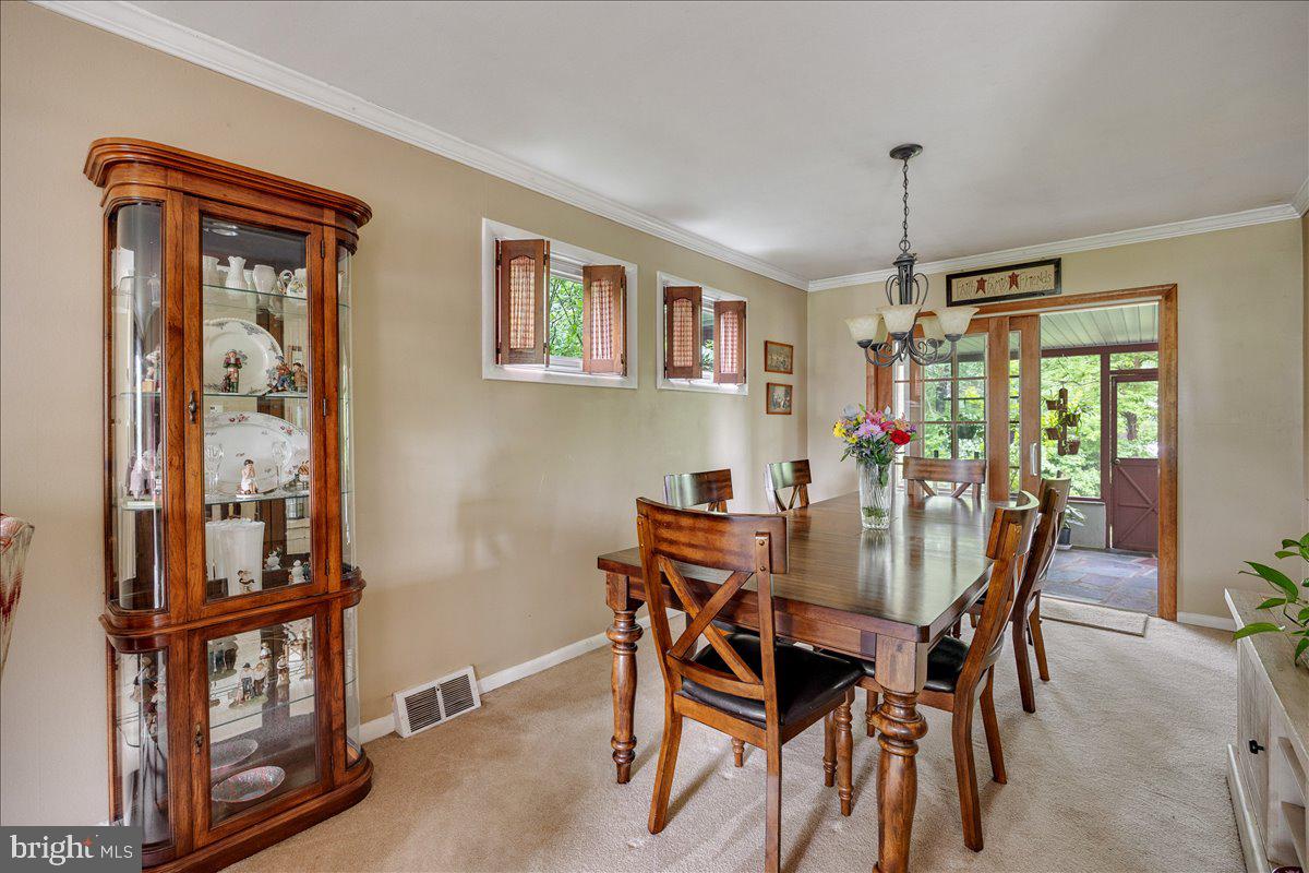 519 Bancroft Road Cherry Hill, NJ 08034 - Photo 10 of 28 a view of a dining room with furniture and a window
