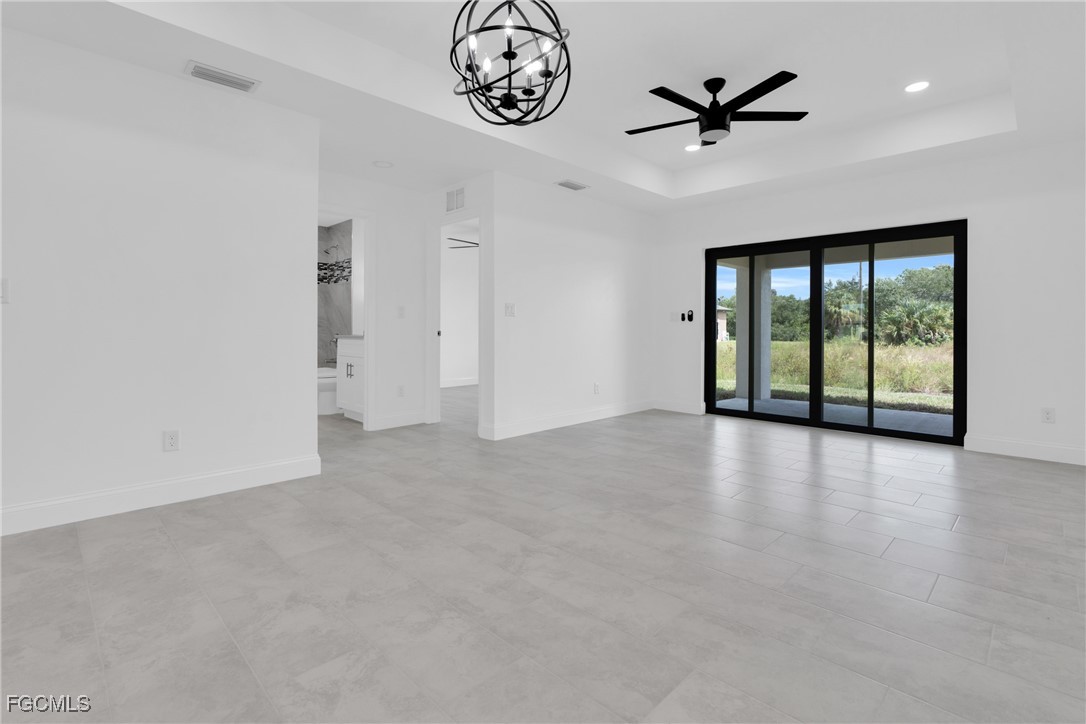 2510 Park Road Lehigh Acres, FL 33971 - Photo 11 of 37 a view of an empty room with a window