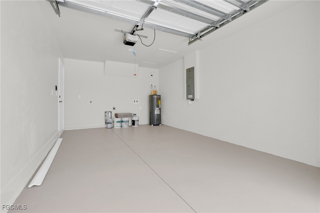 2510 Park Road Lehigh Acres, FL 33971 - Photo 30 of 37 a view of a storage & utility room with utility room