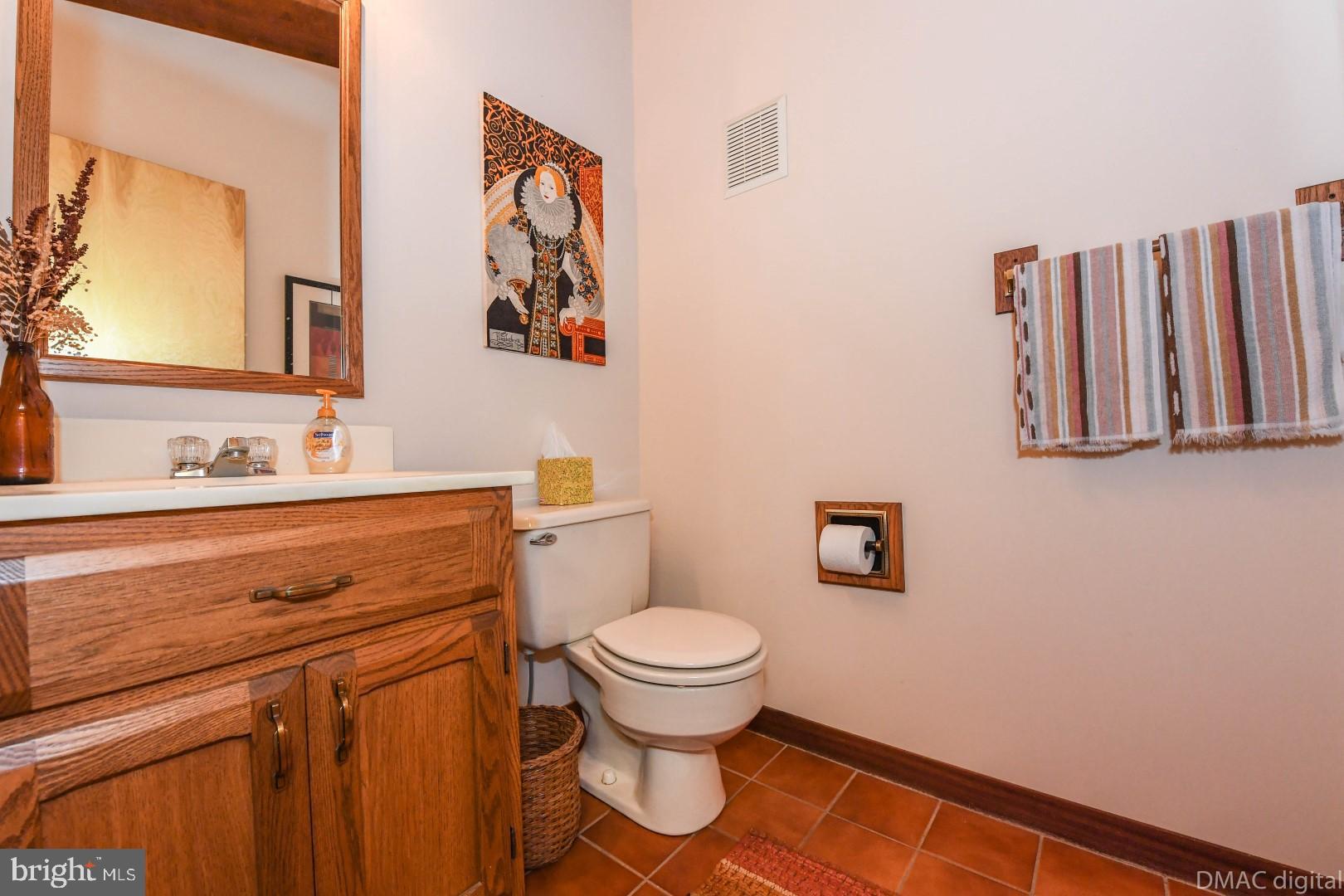 1708 Dahlgren Road Middletown, MD 21769 - Photo 12 of 60 a bathroom with a toilet and a sink