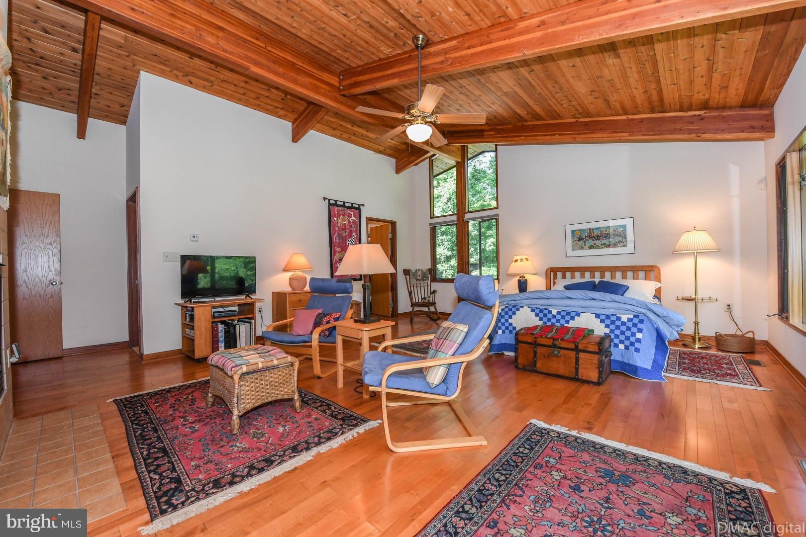 1708 Dahlgren Road Middletown, MD 21769 - Photo 16 of 60 a living room with furniture a fireplace and a table
