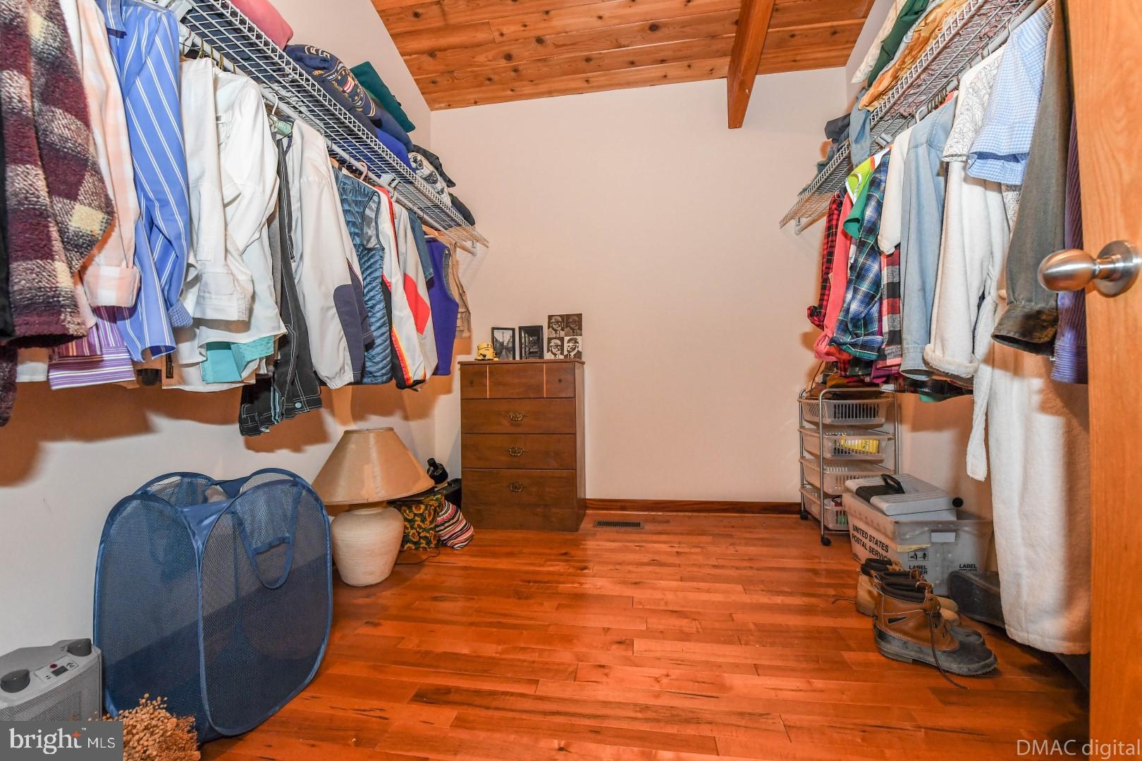 1708 Dahlgren Road Middletown, MD 21769 - Photo 19 of 60 a view of walk in closet with clothes and shoes