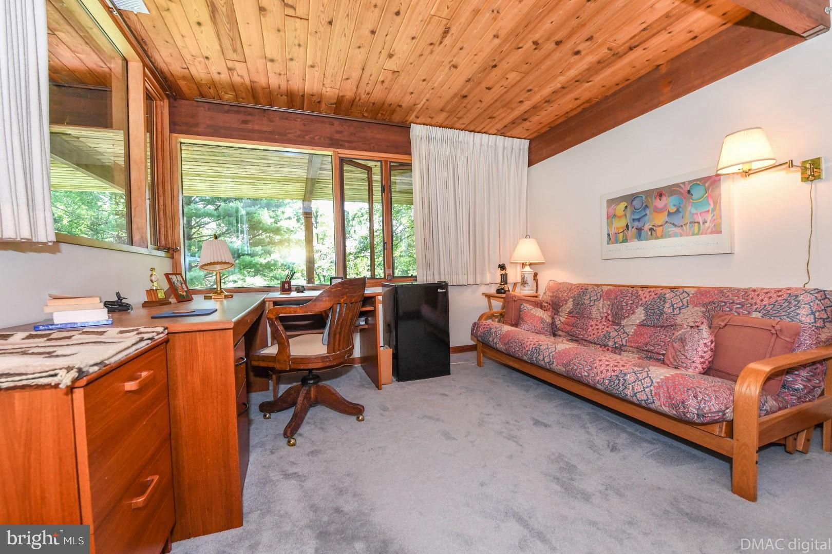 1708 Dahlgren Road Middletown, MD 21769 - Photo 23 of 60 a living room with furniture and a large window
