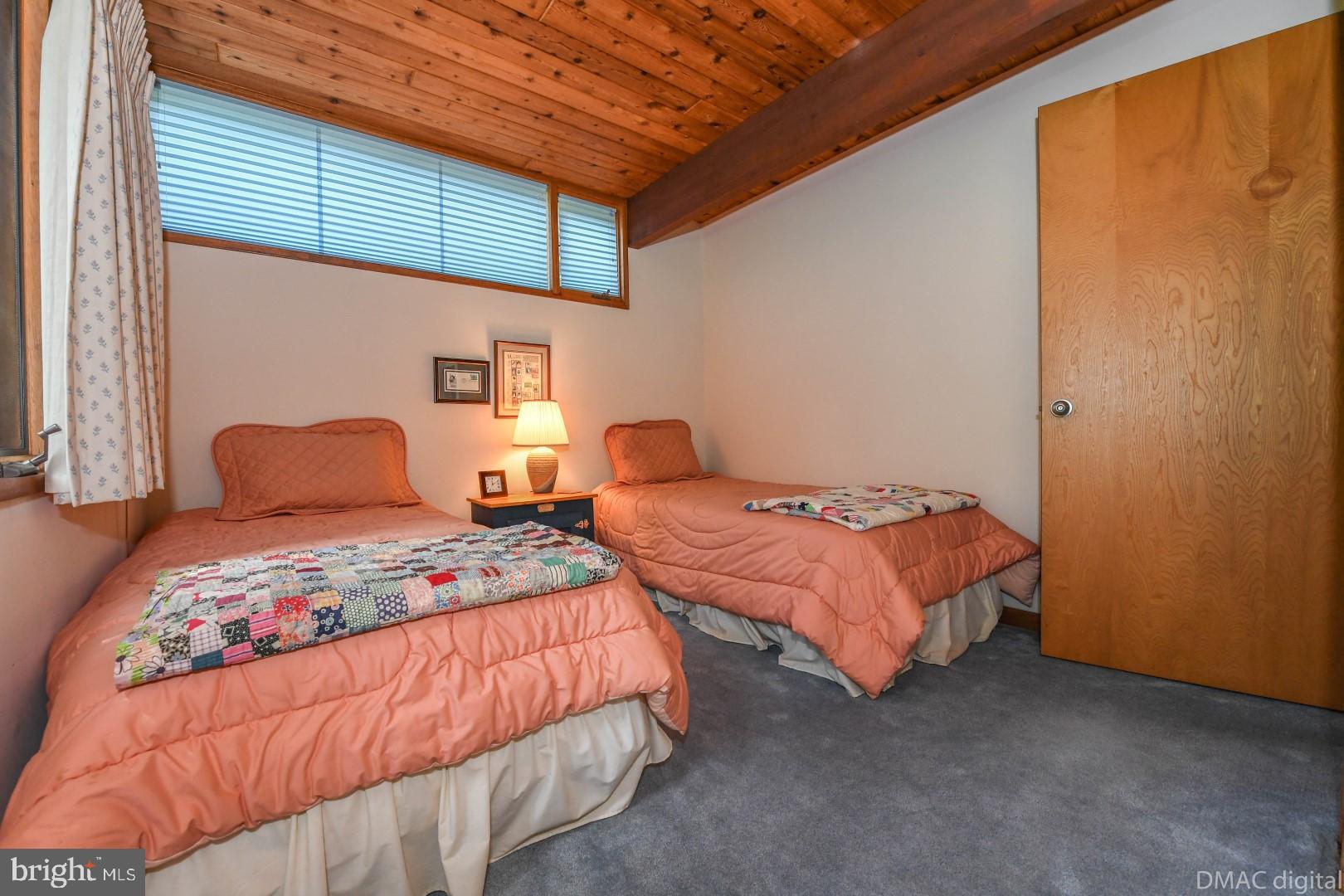 1708 Dahlgren Road Middletown, MD 21769 - Photo 27 of 60 a bedroom with two beds and a window