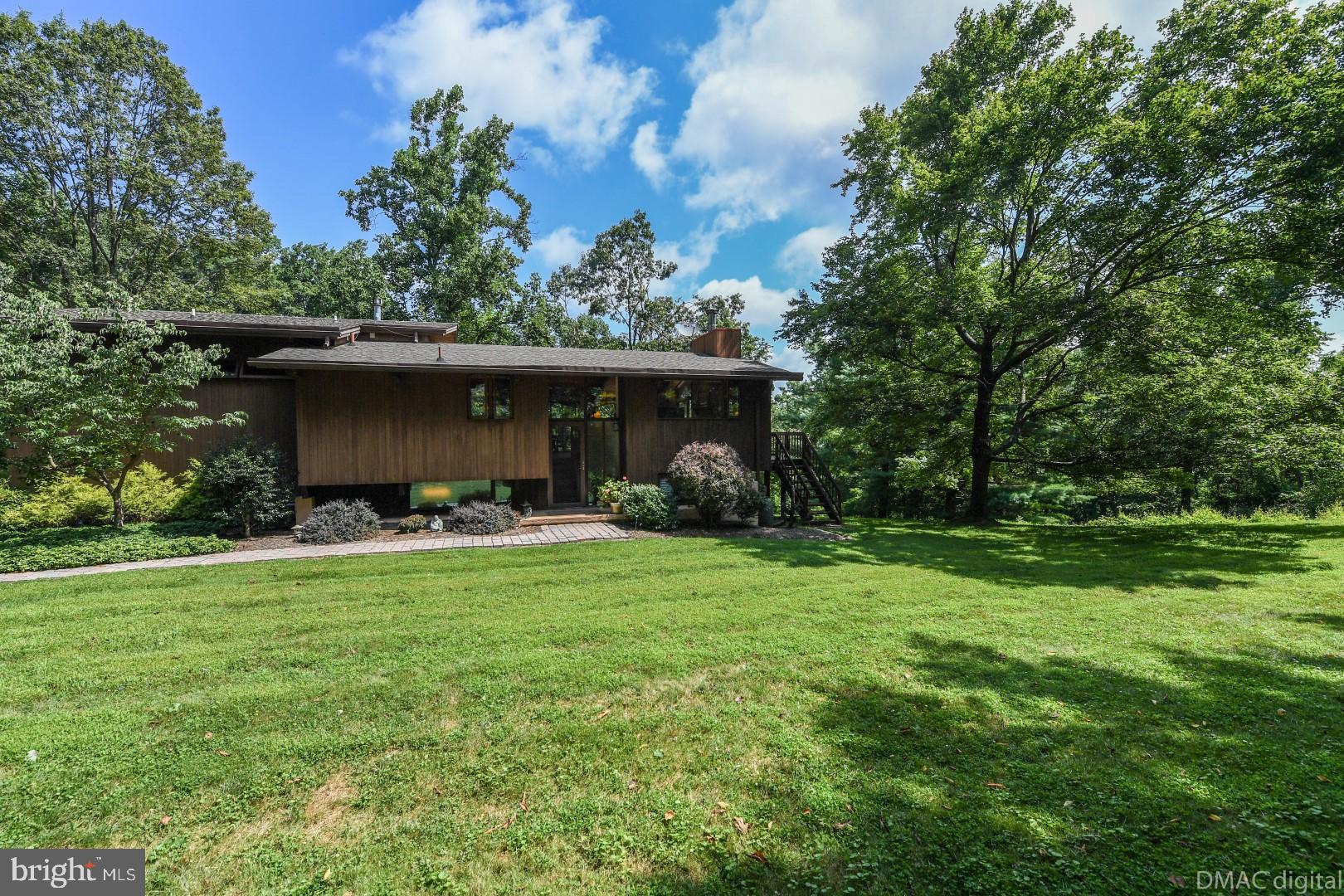 1708 Dahlgren Road Middletown, MD 21769 - Photo 38 of 60 a front view of a house with garden