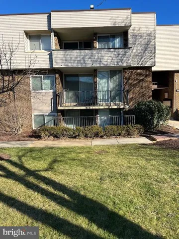 a view of a house with a swimming pool