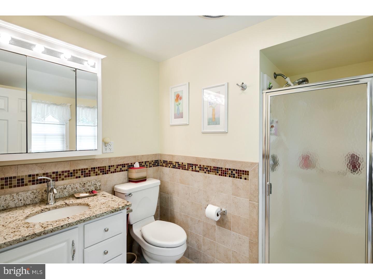 118 Fenwick Road Cherry Hill, NJ 08034 - Photo 16 of 24 a bathroom with a granite countertop sink toilet and shower