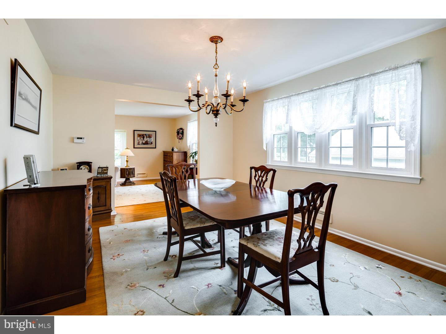 118 Fenwick Road Cherry Hill, NJ 08034 - Photo 7 of 24 a view of a dining room with furniture and chandelier