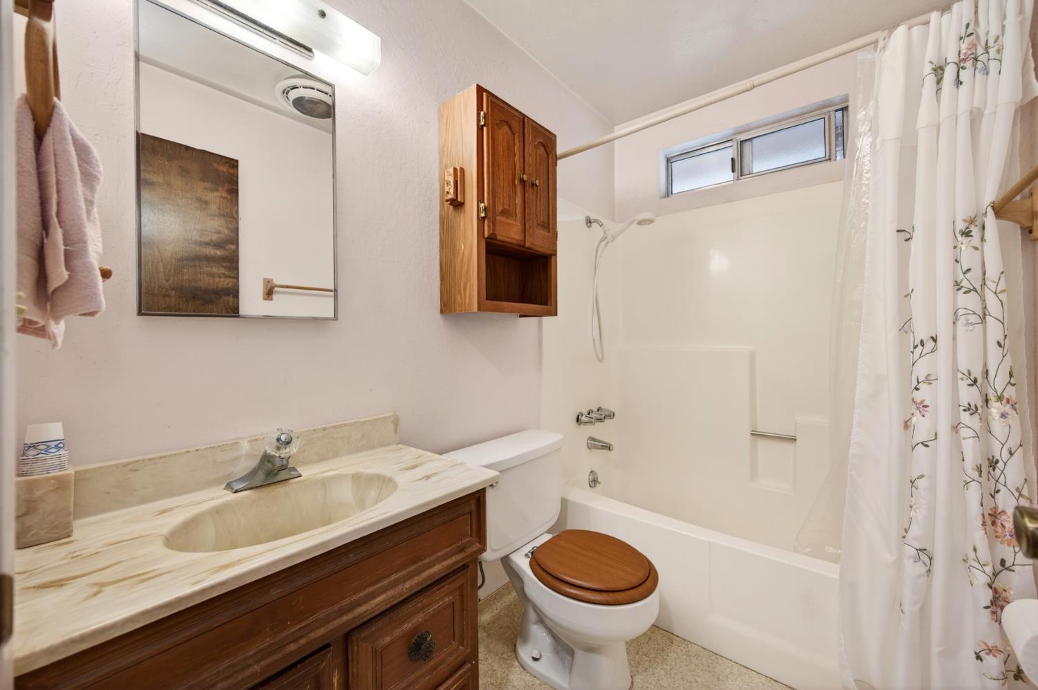 20191 Kit Court Volcano, CA 95689 - Photo 35 of 54 a bathroom with a sink and a mirror