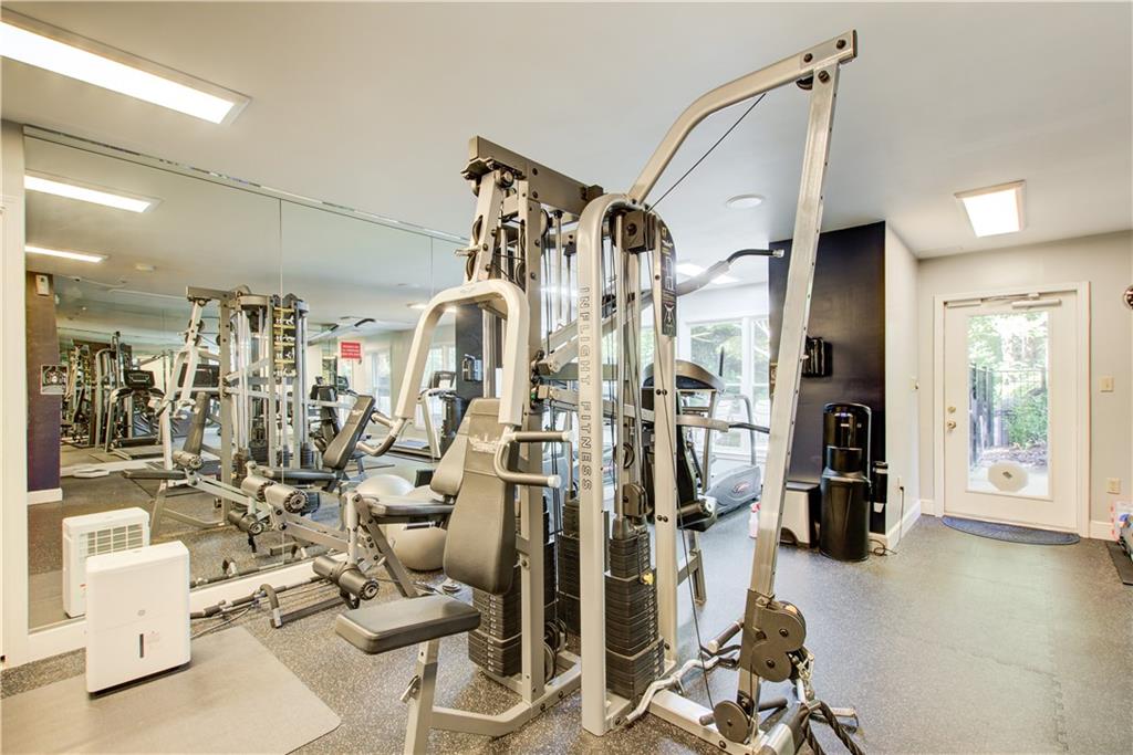 2865 Lenox Road Northeast, Unit 102 Atlanta, GA 30324 - Photo 28 of 35 a view of a room with gym equipment