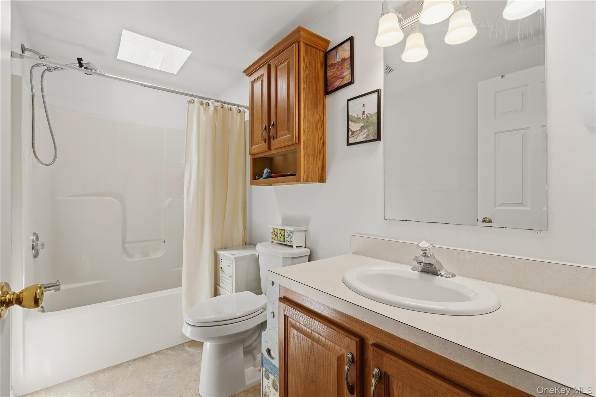 590 Farm To Market Road Brewster, NY 10509 - Photo 27 of 32 a bathroom with a sink toilet and shower