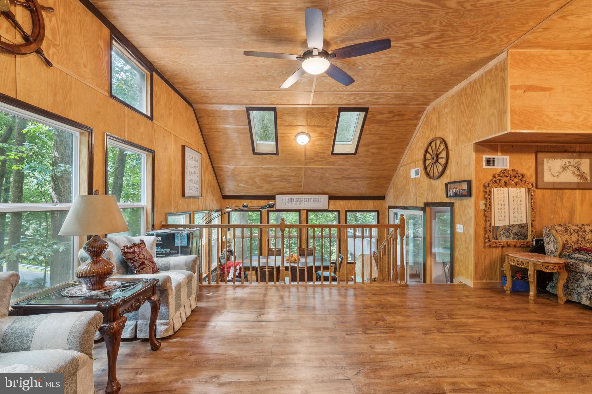 929 High Knob Road Front Royal, VA 22630 - Photo 14 of 30 a living room with lots of furniture and a large window