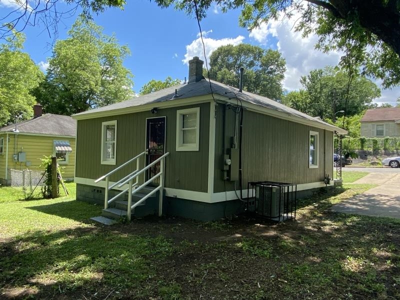 1534 Gabay Street Memphis, TN 38106 - Photo 2 of 8 a view of a house with a yard