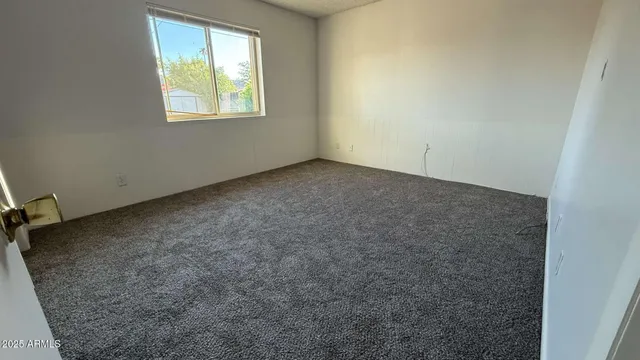 an empty room with a window