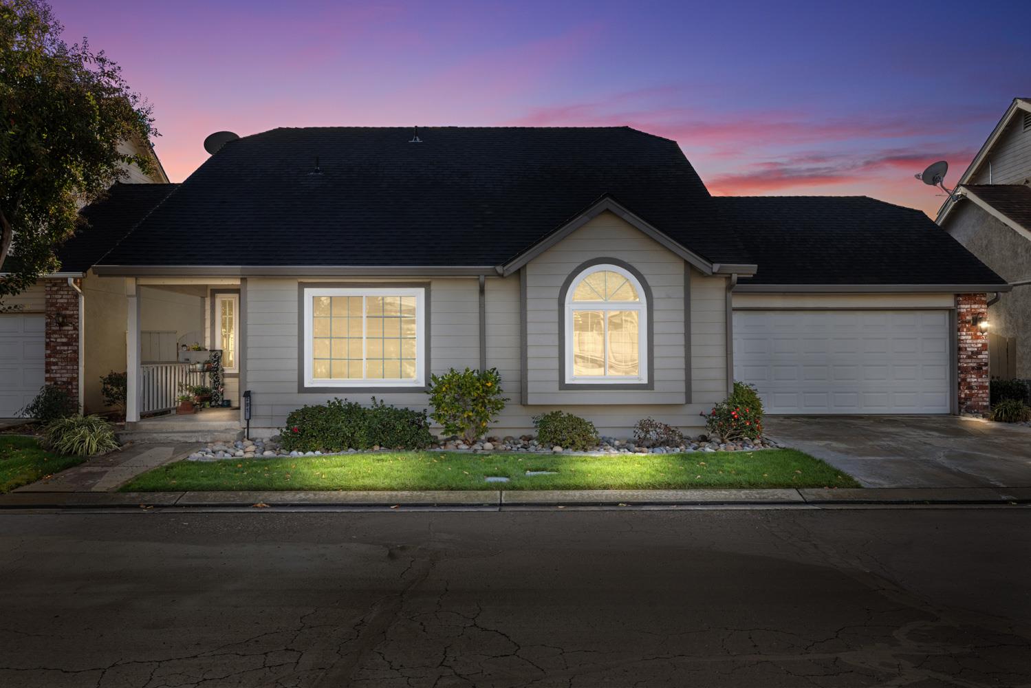 2812 Stone Terrace Modesto, CA 95355 - Photo 3 of 33 front view of a house with a yard