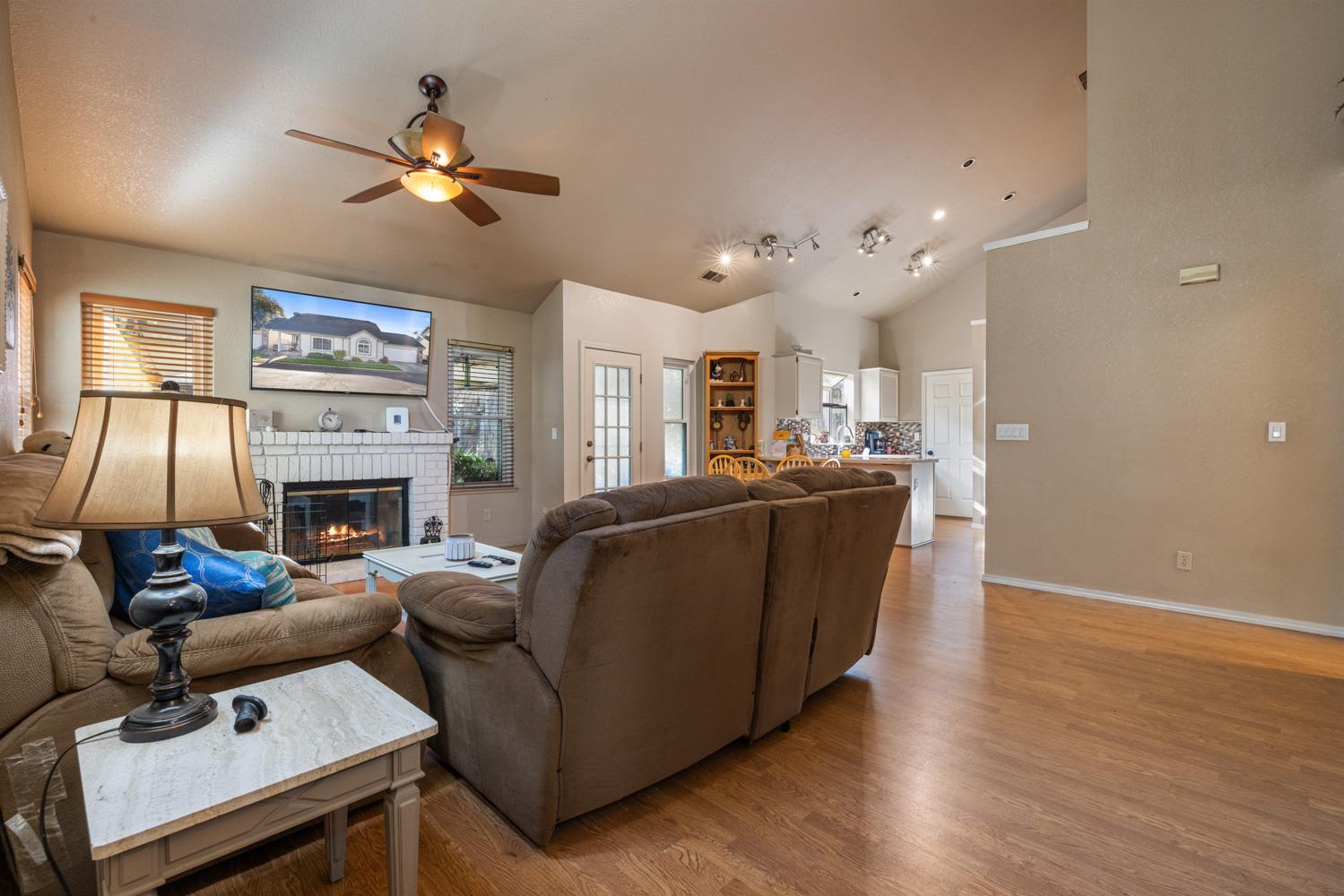 2812 Stone Terrace Modesto, CA 95355 - Photo 8 of 33 a living room with furniture and a fireplace