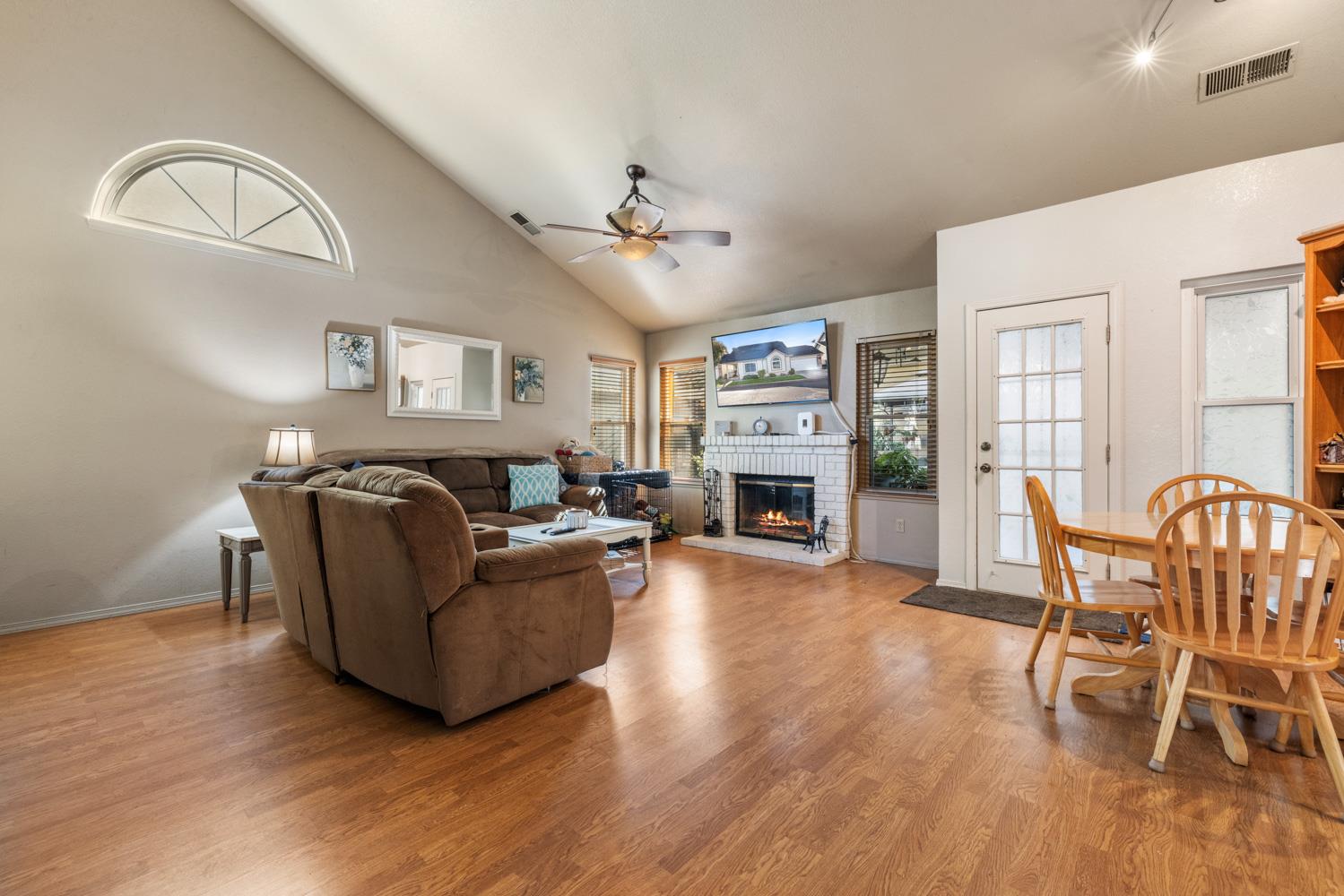 2812 Stone Terrace Modesto, CA 95355 - Photo 9 of 33 a living room with furniture and a fireplace