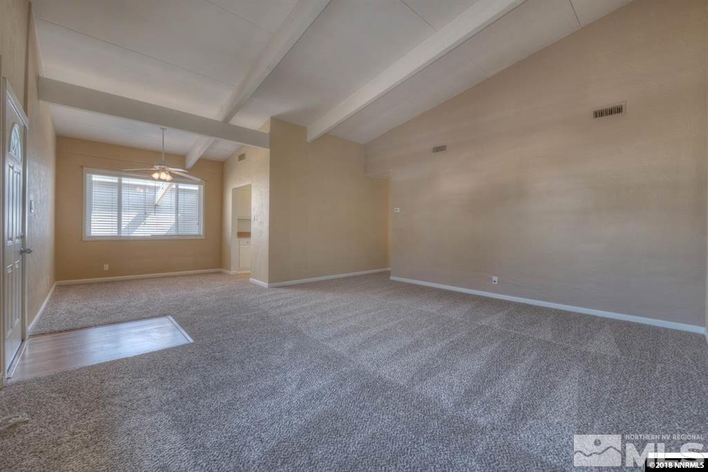 12002 Andes Street Reno, NV 89506 - Photo 2 of 12 an empty room with windows