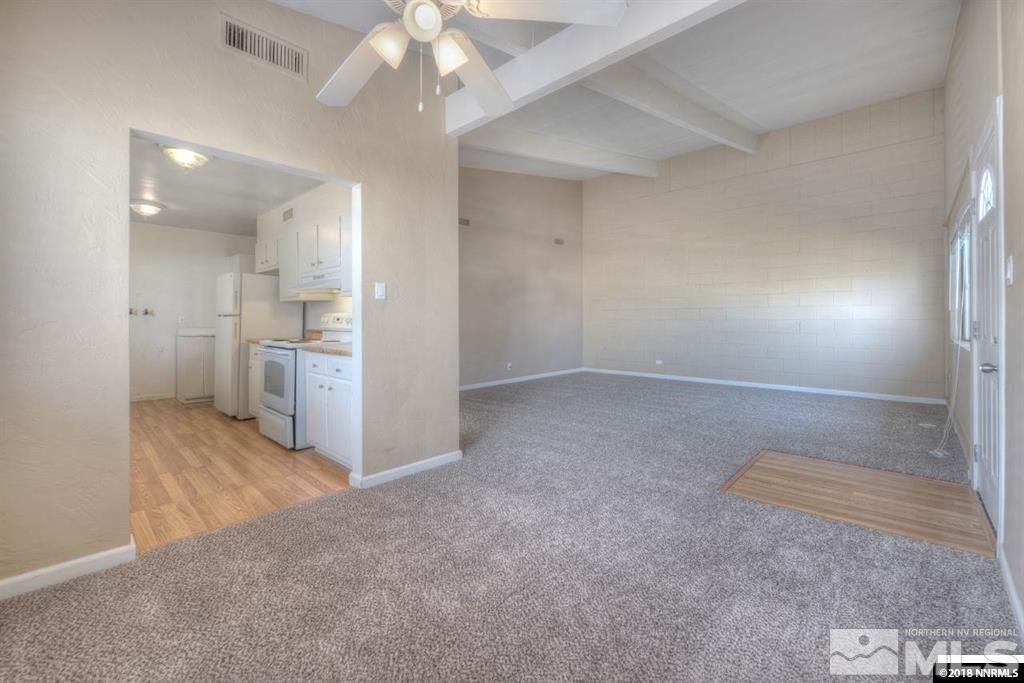 12002 Andes Street Reno, NV 89506 - Photo 3 of 12 an empty room with a bathroom and a sink