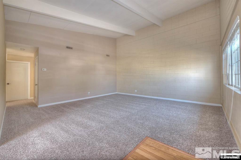 12002 Andes Street Reno, NV 89506 - Photo 4 of 12 a view of an empty room and a window