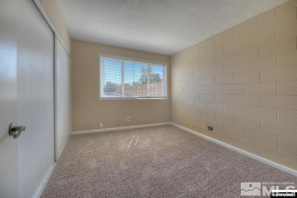 12002 Andes Street Reno, NV 89506 - Photo 7 of 12 a view of an empty room with a window