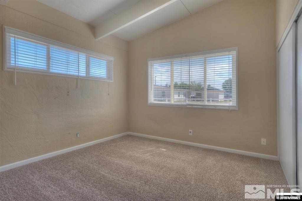 12002 Andes Street Reno, NV 89506 - Photo 8 of 12 a view of an empty room with a window