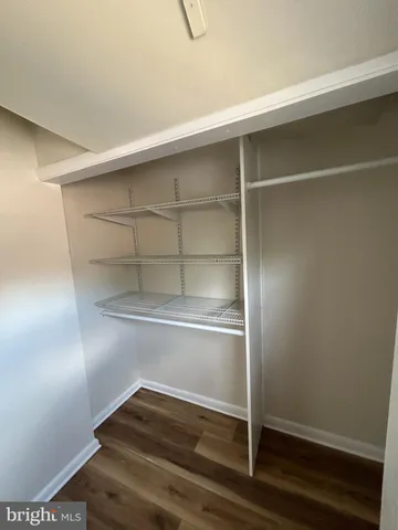 a view of an empty walk in closet