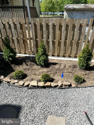 a view of a back yard of the house
