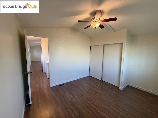 a view of room with hardwood floor