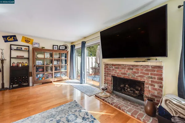a kitchen with stainless steel appliances granite countertop a sink counter space and a center island