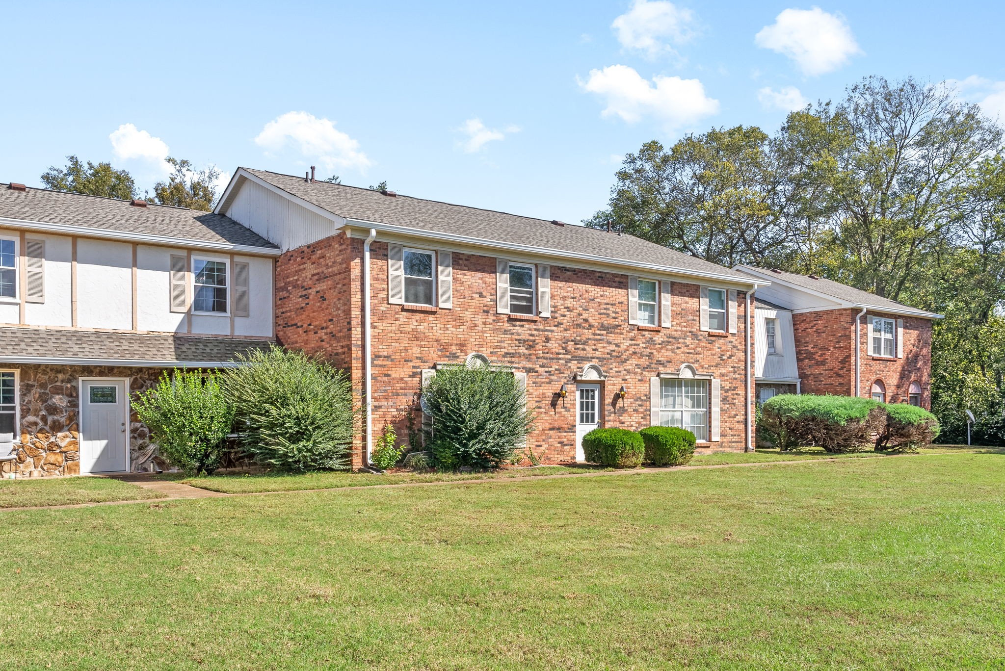 1301 Neelys Bend Road, Unit 22 Madison, TN 37115 - Photo 13 of 22 a front view of a house with garden