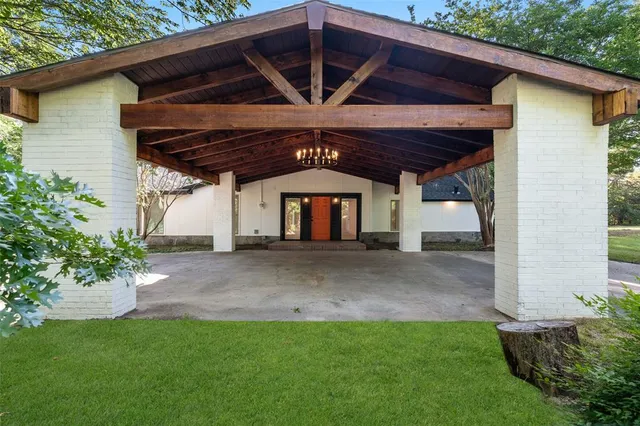 a view of a backyard with a small cabin