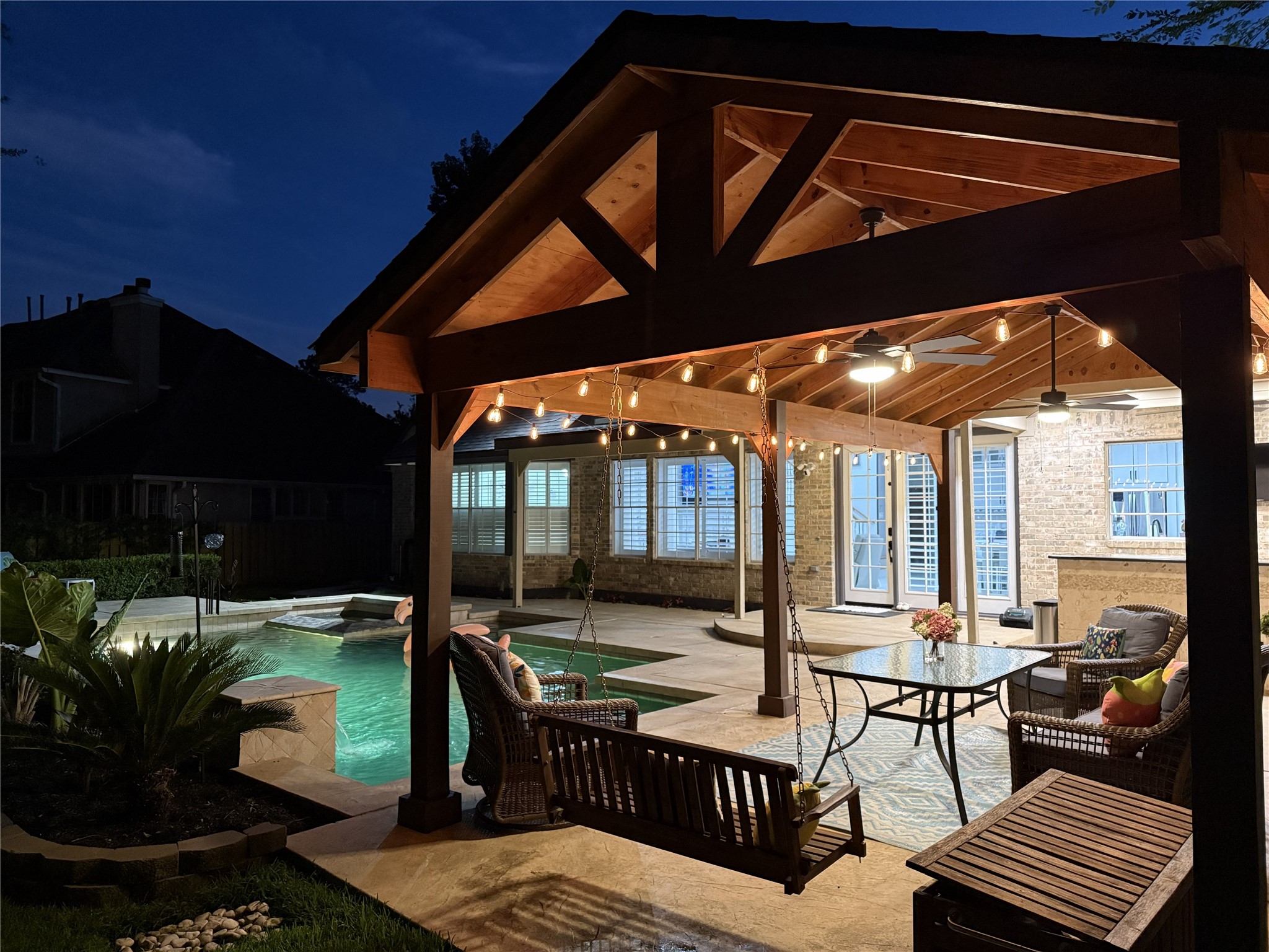 15 West Beckonvale Circle The Woodlands, TX 77382 - Photo 40 of 44 A stunning rear elevation view at dusk!